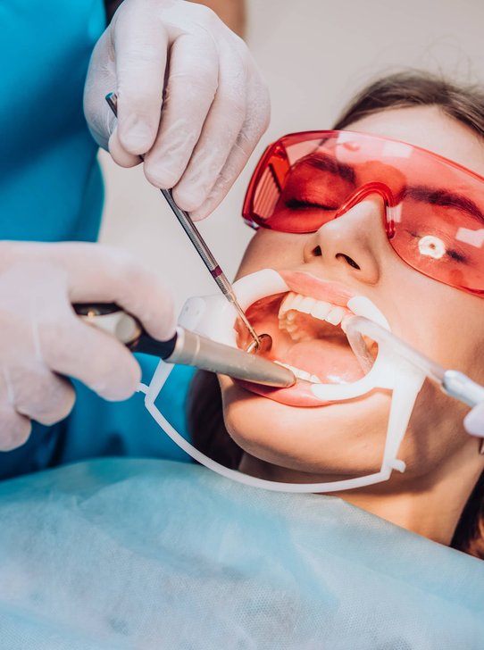 Dentist fitting custom dental appliance for patient in Oak Harbor